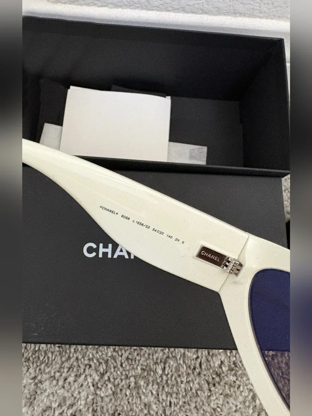 CHANEL Black Cat-Eye Sunglasses with Brown Lenses